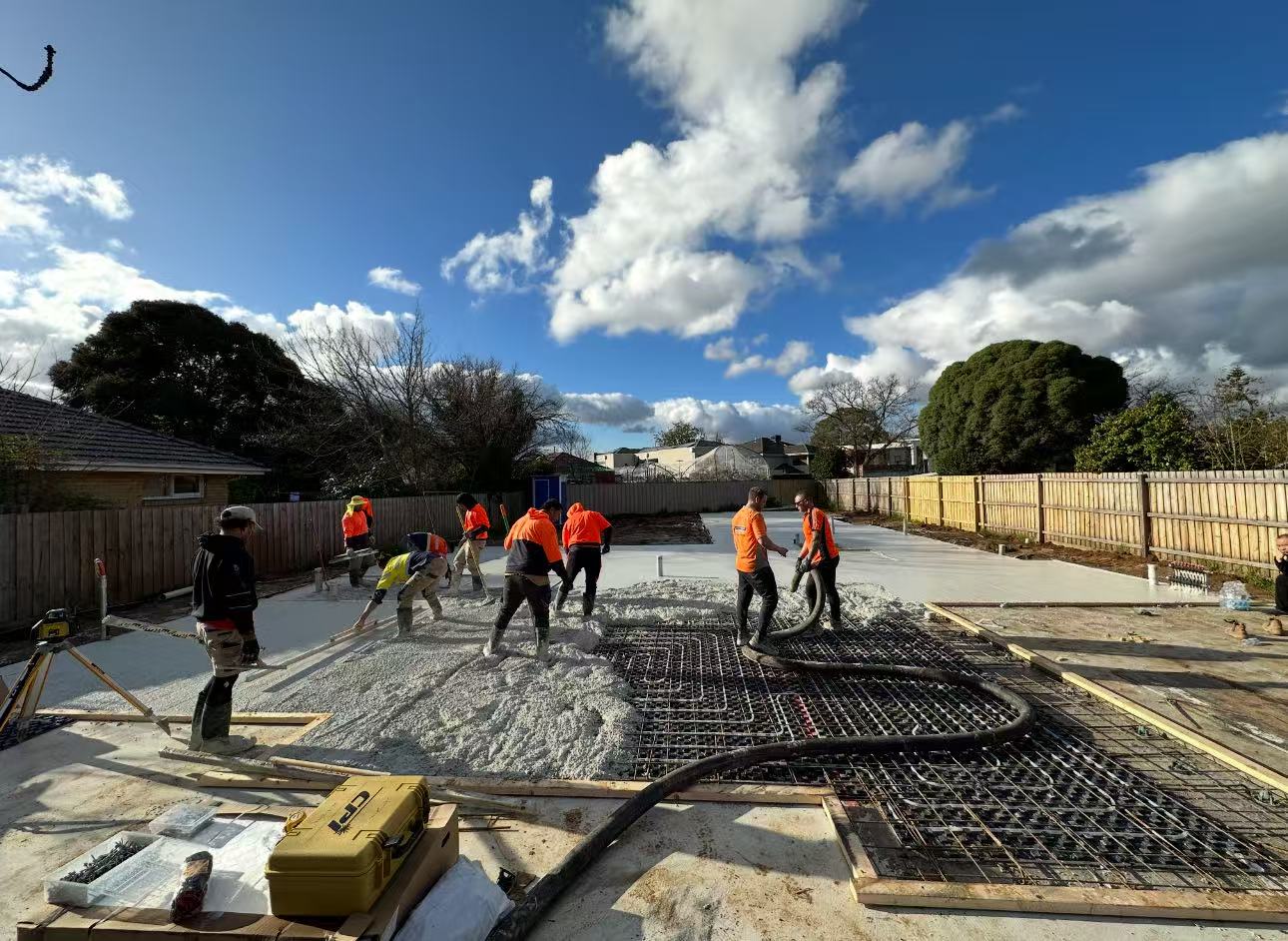 Team measuring and planning on site